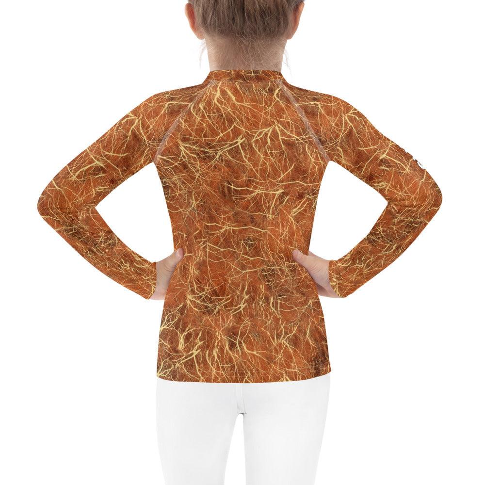 Close-up of the vibrant pattern on Fantasia's Mischievous Glimmers Kids Rash Guard.