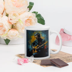 White glossy mug with fingerstyle design for musicians.