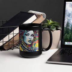 Close-up of Graphic Genius black glossy mug with stylish design.