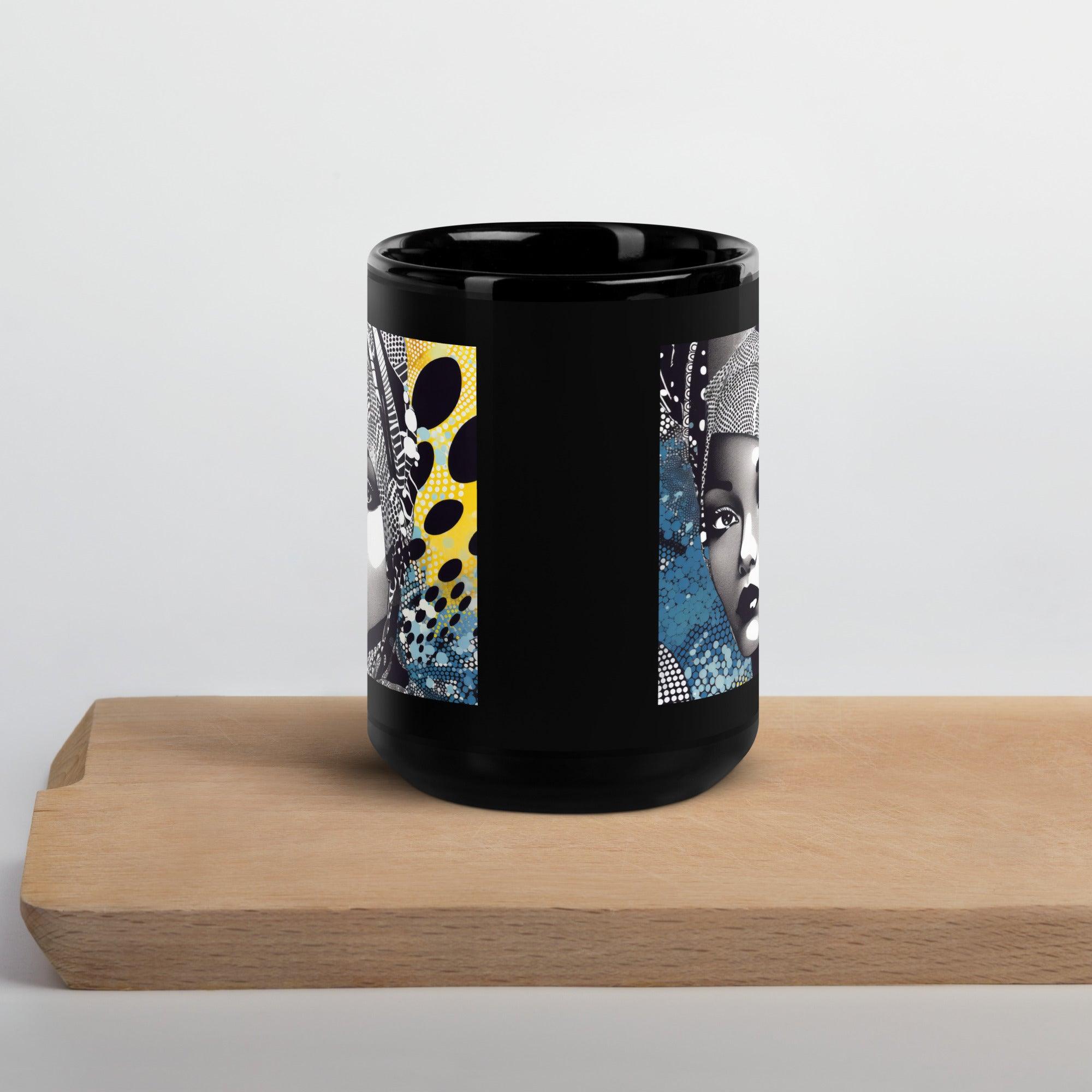 Graphic Guru Black Glossy Mug on a desk with books and a laptop.