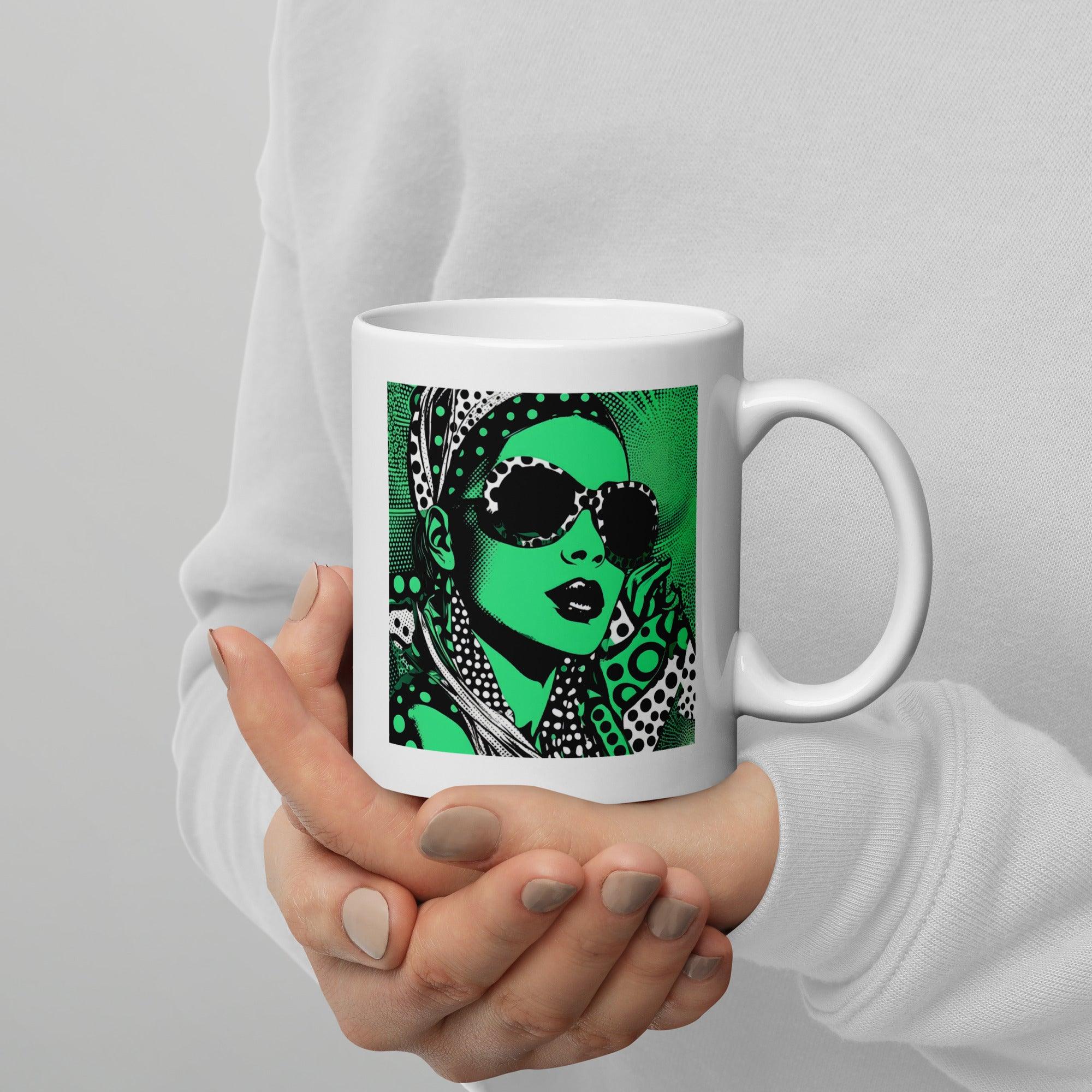 Person holding a white glossy inked ideation mug filled with coffee.