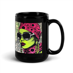 Hand holding the Inked Intensity glossy black coffee mug