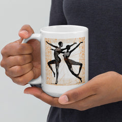 White glossy mug with feminine dance motif.