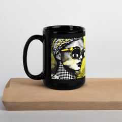 Line Lengths black mug filled with coffee.