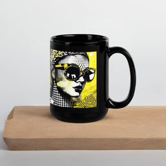 Stylish glossy black tea mug in natural light.