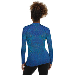 Close-up of Line Luminance women's rash guard material.