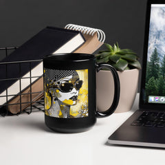 Close-up of a black glossy coffee mug with modern line patterns.