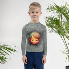 Kids Rash Guard with Magical Cherubs design in sunlight.