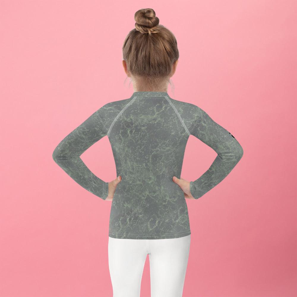 Back view of child in Magical Cherubs Kids Rash Guard.