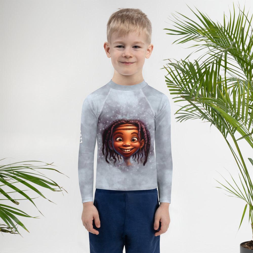 Child wearing Magical Peepers Collection colorful kids rash guard at the beach.