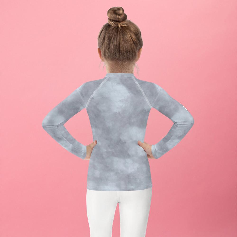 Close-up of the Magical Peepers Collection rash guard fabric texture.