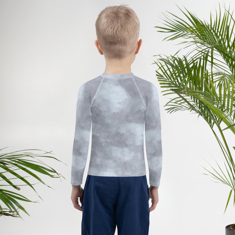 Magical Peepers Collection kids rash guard laid flat on a white background.