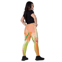 Durable crossover leggings with pockets for active wear.