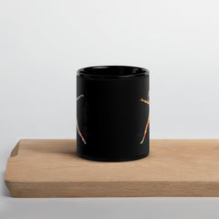 Elegant black glossy mug with balletic design detail