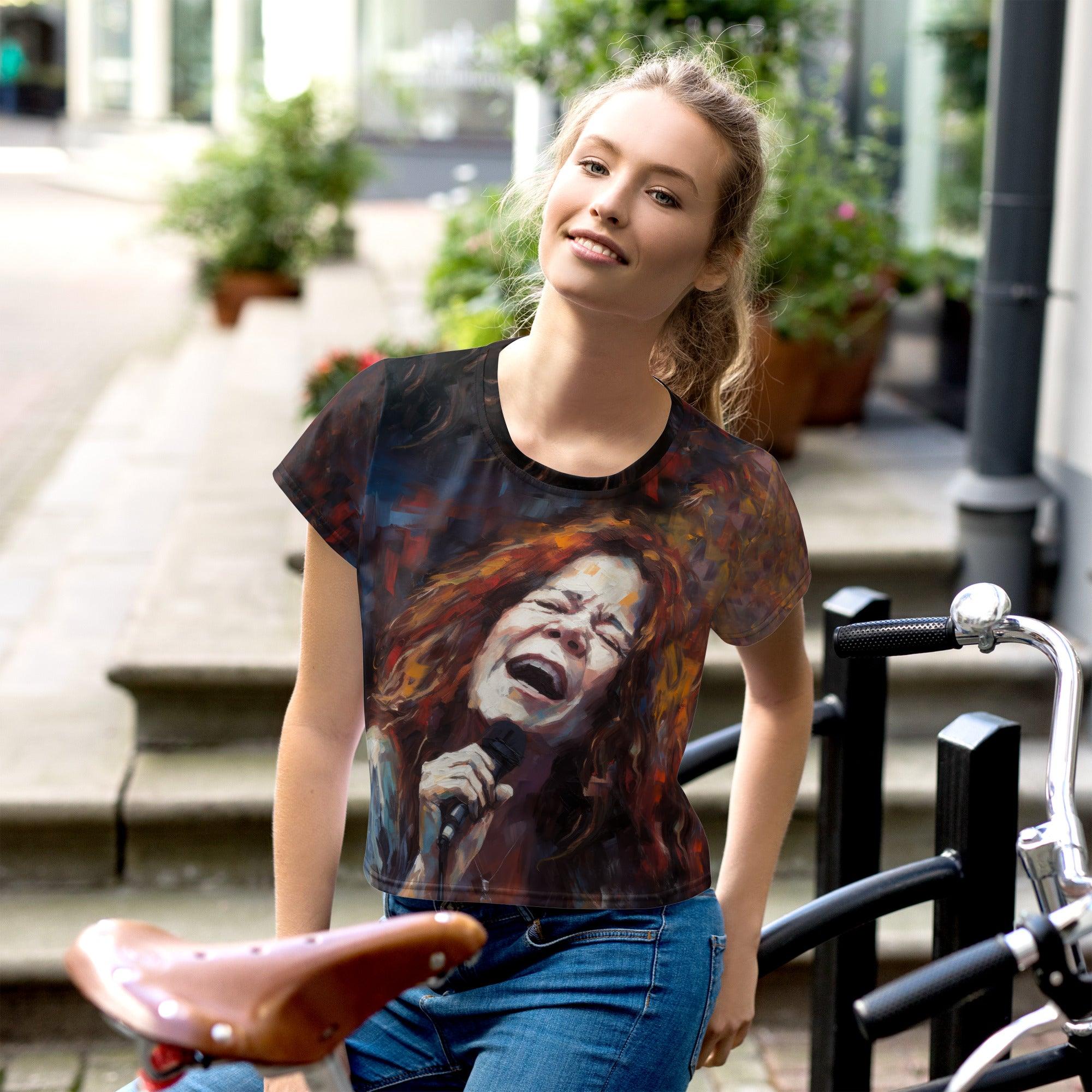 Melodic Madness crop tee with vibrant all-over print design.