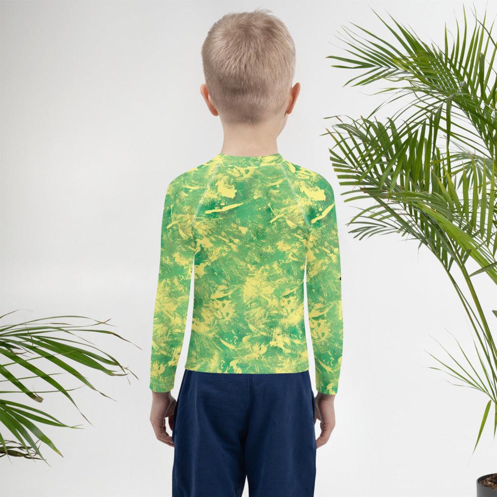 Child in 'Mischief In Their Eyes' Rash Guard, protection & style.