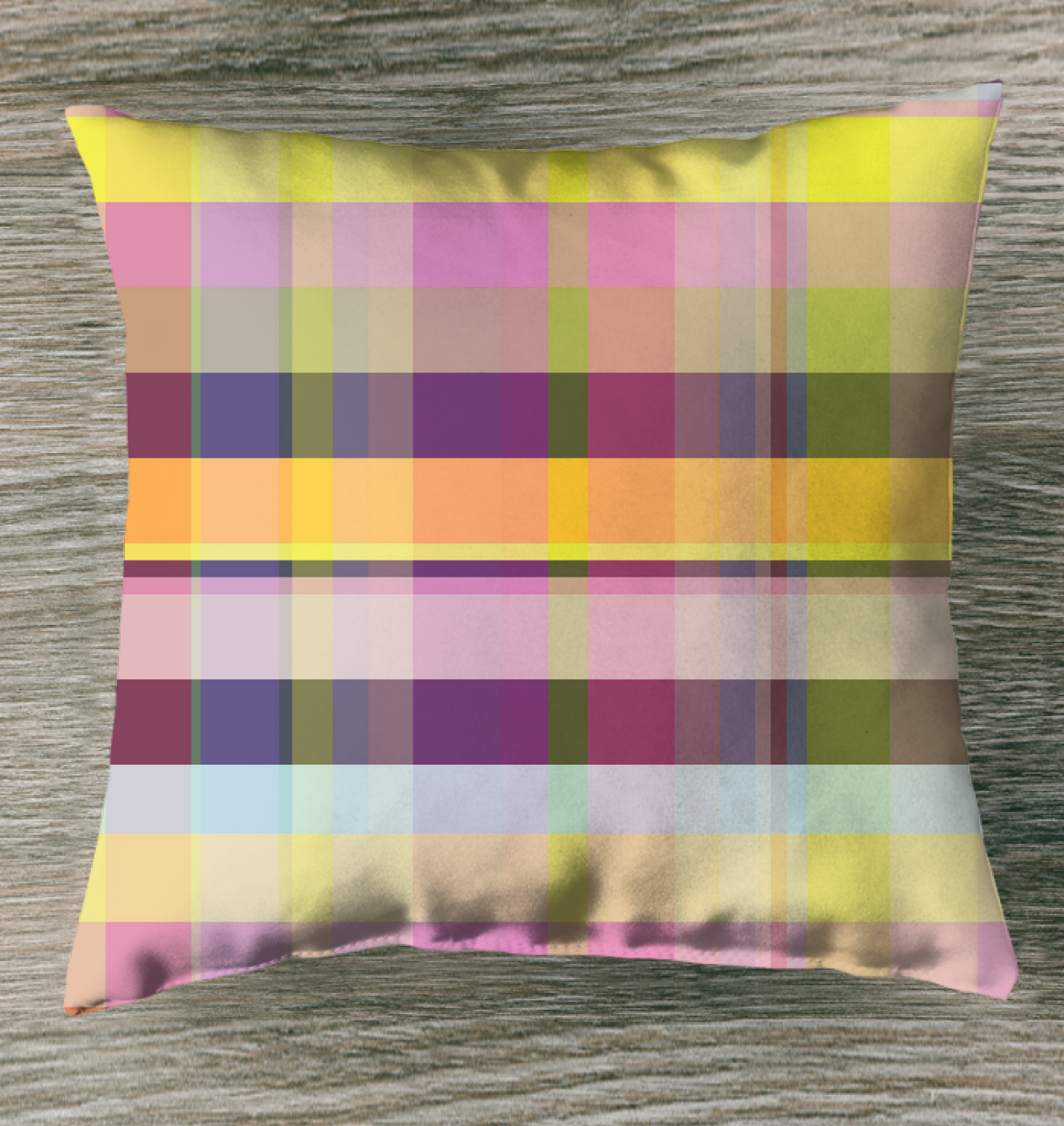 Neon Dreams Outdoor Pillow showcased on a patio sofa, infusing the outdoor area with its striking neon hues.