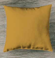 Colorful outdoor pillow featuring a desert sunset scene, perfect for patios.