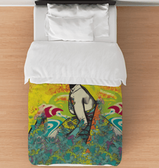 Surfing 1 49 Twin Comforter on a bed, showcasing its dynamic surf design for a vibrant bedroom makeover.