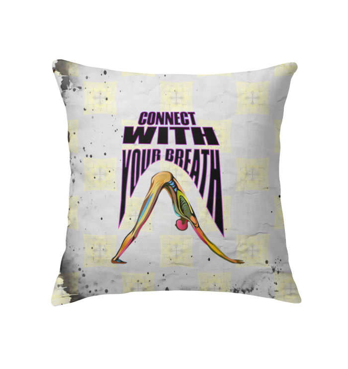 Triangle Pose Focus Indoor Pillow on a cozy armchair.