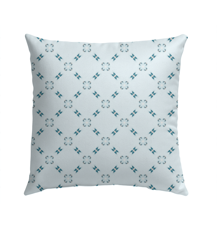 Outdoor pillow featuring Symphony in Serenity design on a patio chair.