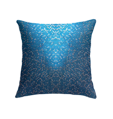 Artistic golden spiral pattern on decorative pillow.