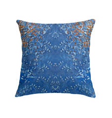 Whispering Leaves pillow on a cozy couch, enhancing the home's interior with its nature-inspired pattern.