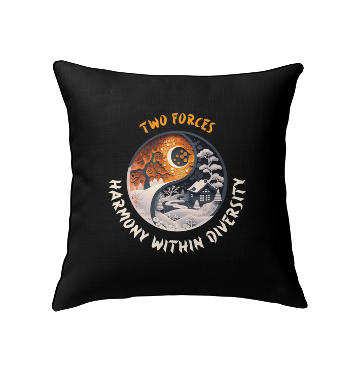 Whispering Winds Yin Yang Indoor Pillow on a sofa.