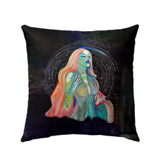 Vibrant Enchanted Garden Outdoor Pillow on a patio chair.