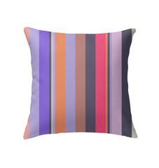 Electric Sunrise Stripe Indoor Pillow on a vibrant living room sofa.