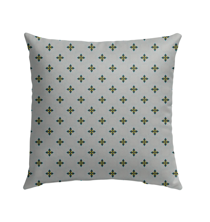 Elegant outdoor pillow with swirl designs.