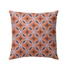 Colorful tropical leaves design on outdoor pillow for patio decor.