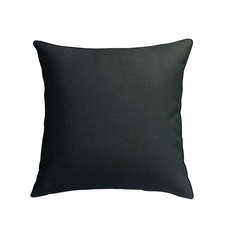 Stylish Crescendo Canvas pillow adding comfort to a cozy armchair.