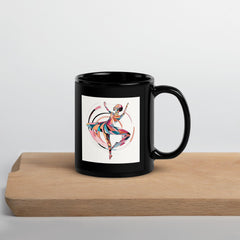 Elegant black coffee mug with unique dance form design.