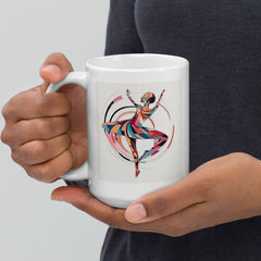 Artistic white tea mug with feminine dance motif.