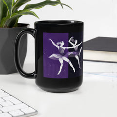 Elegant black coffee mug featuring female dancers in motion