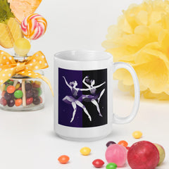 Stylish white mug featuring women in dance poses.