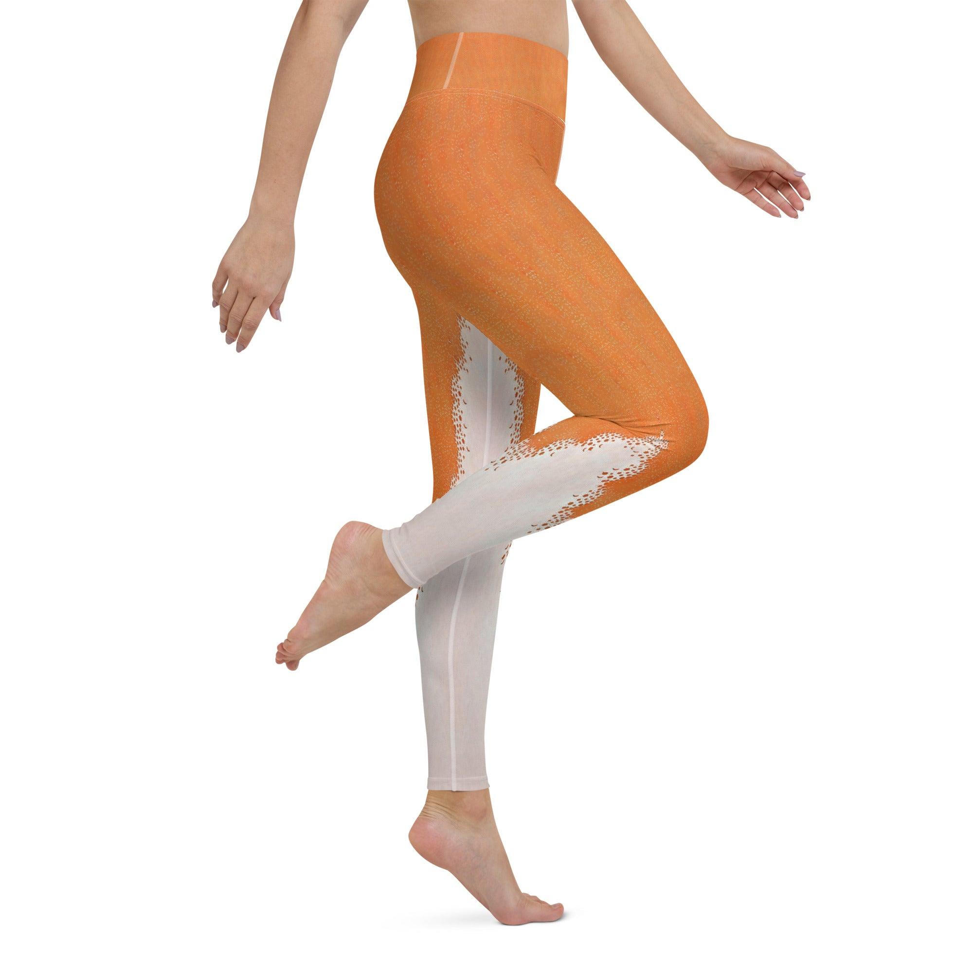 Woman practicing yoga wearing Orange Nova Leggings.