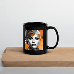 Painted Palates black glossy mug on a kitchen counter.