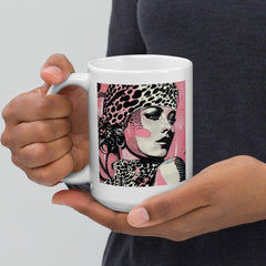 Artistic white glossy mug from Painted Passions collection on a wooden surface.