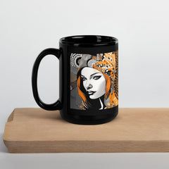 Close-up of black glossy mug with unique paint style.