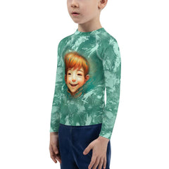 Child running on beach in Fairy Stares Kids Rash Guard.