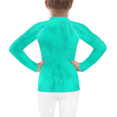 Close-up of the Regal Gaze kids rash guard fabric and pattern.