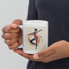 White glossy mug featuring women's dance attire design.