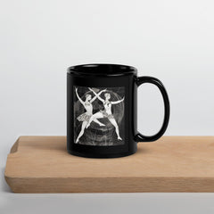 Black glossy coffee mug with sensual women's dance attire design.