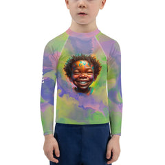 Kid smiling in Seraphic Sparkling Eyes UV Protective Rash Guard.