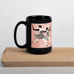 Stylish black mug featuring a graceful dance motif for tea and coffee