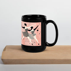 Artistic black coffee mug with a feminine dance illustration in gloss finish