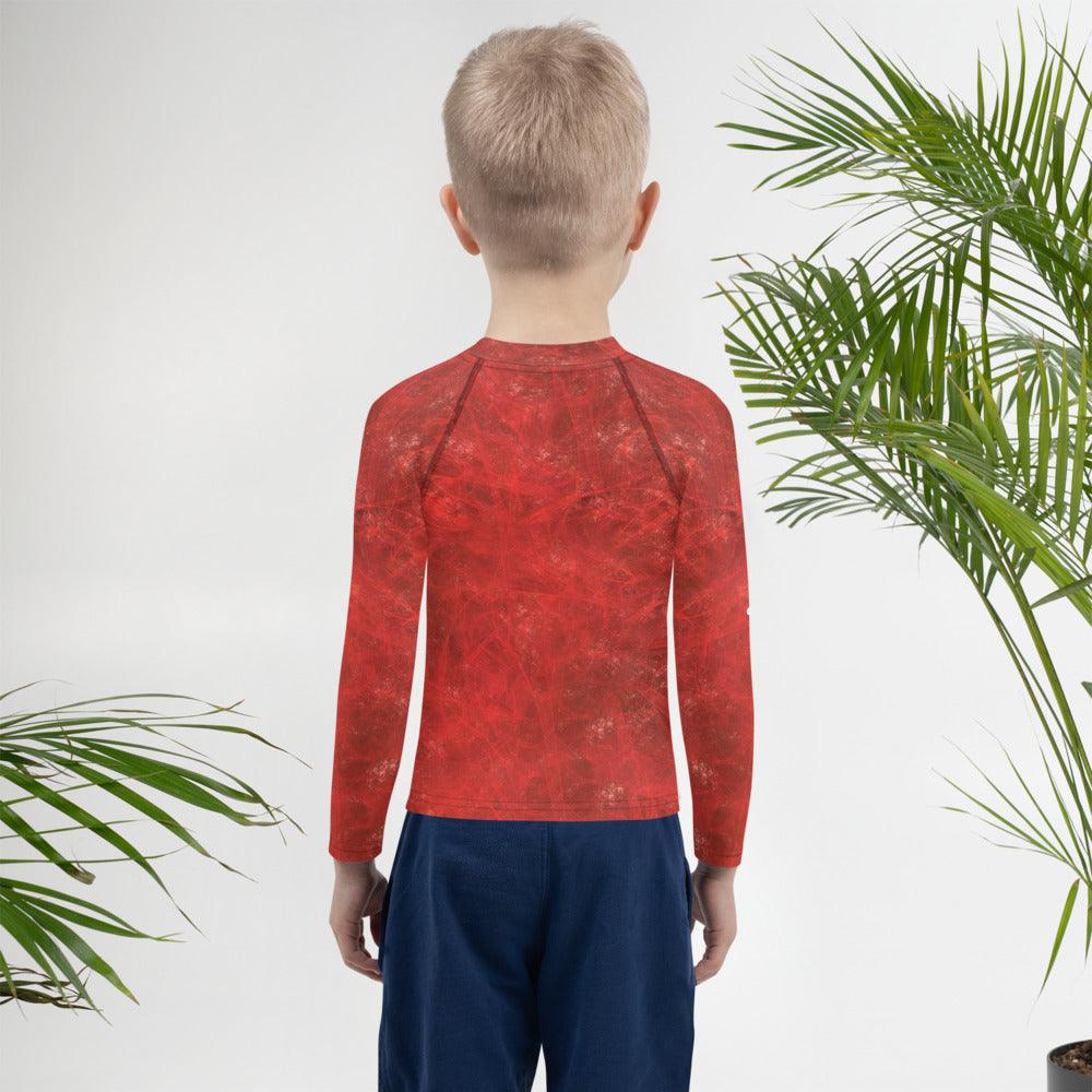 Kid swimming in pool wearing Serene Gaze of Fantasy Rash Guard.