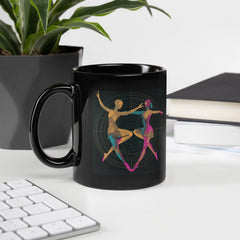 Elegant black mug featuring dance-inspired artwork for a stylish flair.